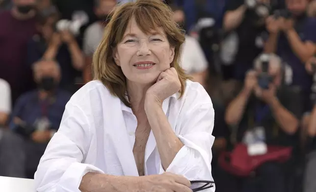 FILE - Jane Birkin poses for photographers at the photo call for the film 'Jane By Charlotte' at the 74th international film festival, Cannes, southern France, Thursday, July 8, 2021. (AP Photo/Brynn Anderson, File)
