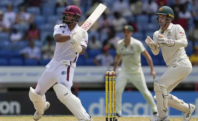 West Indies' Brandon King plays a shot against Australia during day two of the second cricket Test match at National Cricket Stadium in St. George's, Grenada, Friday, July 4, 2025. (AP Photo/Ricardo Mazalan)