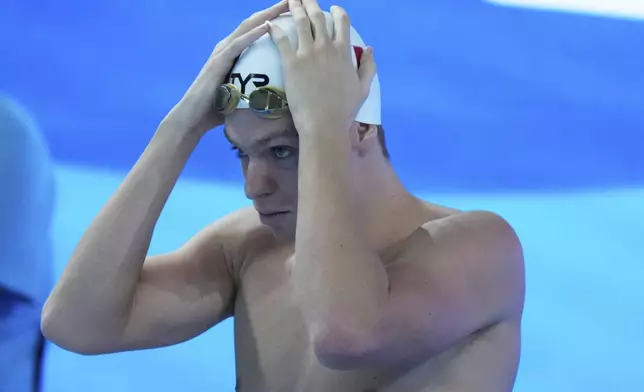 Leon Marchand of France prepares to compete in the men's 200-meter individual medley heats at the World Aquatics Championships in Singapore, Wednesday, July 30, 2025. (AP Photo/Lee Jin-man)