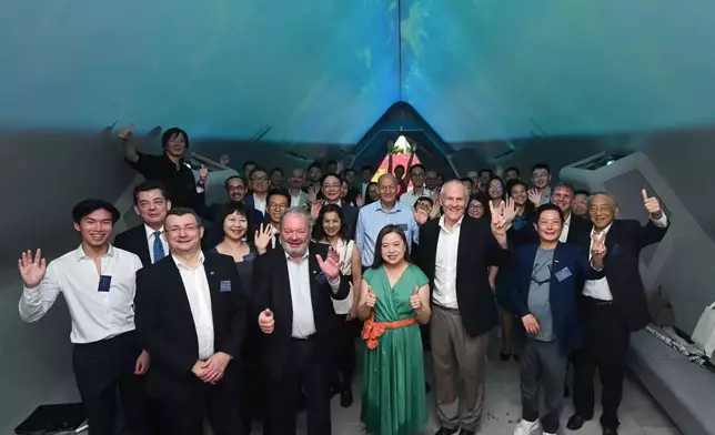 HKSAR Government Secretary for Culture, Sports and Tourism Rosanna Law (front row, centre), Club Steward Nicholas Hunsworth (front row, 3rd left), Club Steward Andrew Weir (front row, 2nd left) and other guests pose for a photo inside the pavilion.