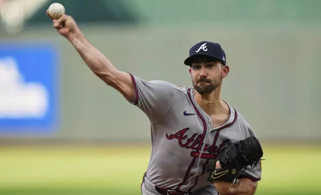 Atlanta Braves starting pitcher Spencer Strider throws during the first inning of a baseball game against the Kansas City Royals, Monday, July 28, 2025, in Kansas City, Mo. (AP Photo/Charlie Riedel)