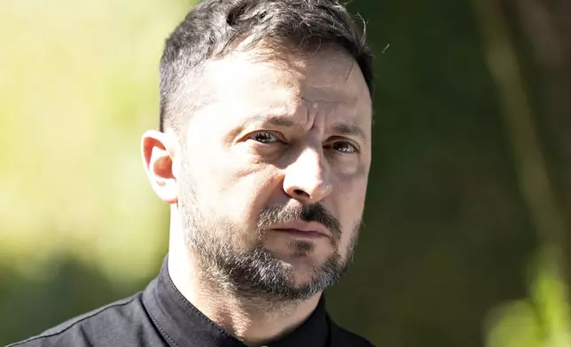 Ukraine's President Volodymyr Zelenskyy looks on as he arrives at Marselisborg Castle on the occasion of Denmark taking over the EU presidency, in Aarhus, Denmark, Thursday, July 3, 2025. (Henning Bagger/Ritzau Scanpix via AP)