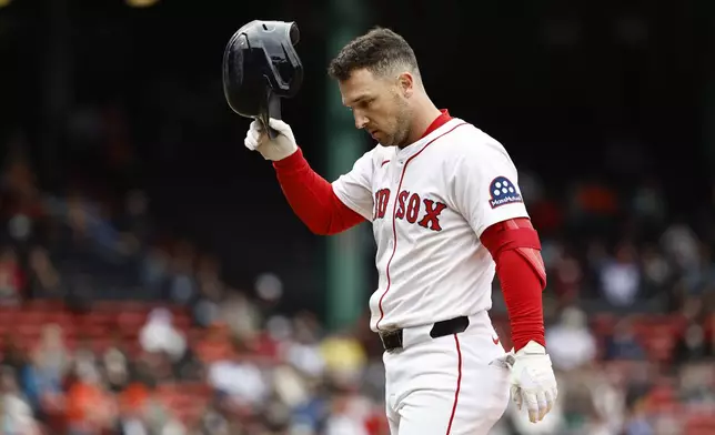 FILE - Boston Red Sox's Alex Bregman heads for the dugout after injuring himself on a single against the Baltimore Orioles during the fifth inning in the first baseball game of a doubleheader on May 23, 2025, at Fenway Park in Boston. (AP Photo/Winslow Townson, File)