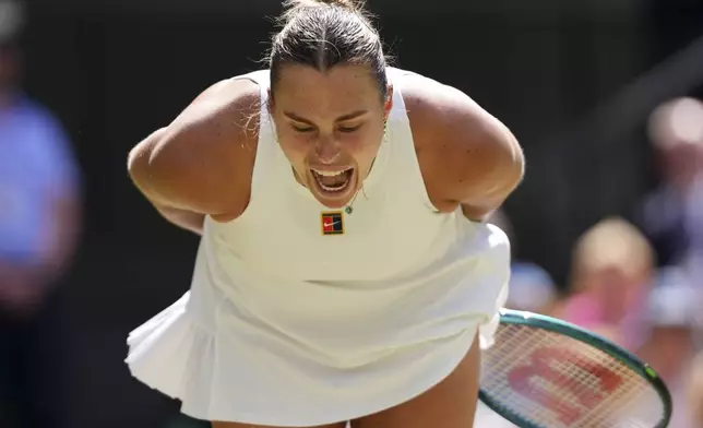 Aryna Sabalenka of Belarus shouts during the women's singles semifinal match against Amanda Anisimova of the U.S. at the Wimbledon Tennis Championships in London, Thursday, July 10, 2025.(AP Photo/Kirsty Wigglesworth)