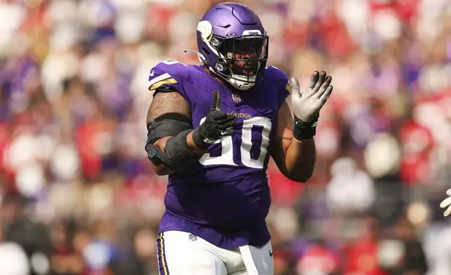 FILE - Minnesota Vikings defensive end Jonathan Bullard reacts after a play during the second half of an NFL football game against the San Francisco 49ers, Sept. 15, 2024 in Minneapolis. (AP Photo/Stacy Bengs, File)