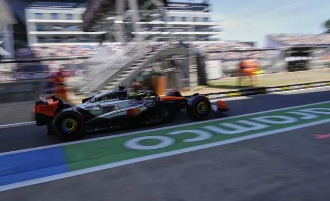 McLaren driver Lando Norris of Britain exits the pit lane during the first practice of the British Formula One Grand Prix in Silverstone, England, Friday, July 4, 2025. (AP Photo/Darko Bandic)