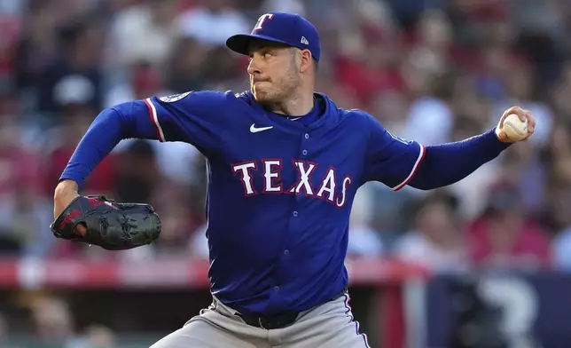 Texas Rangers starting pitcher Patrick Corbin throws to the plate during the second inning of a baseball game against the Los Angeles Angels, Thursday, July 10, 2025 in Anaheim, Calif. (AP Photo/Mark J. Terrill)