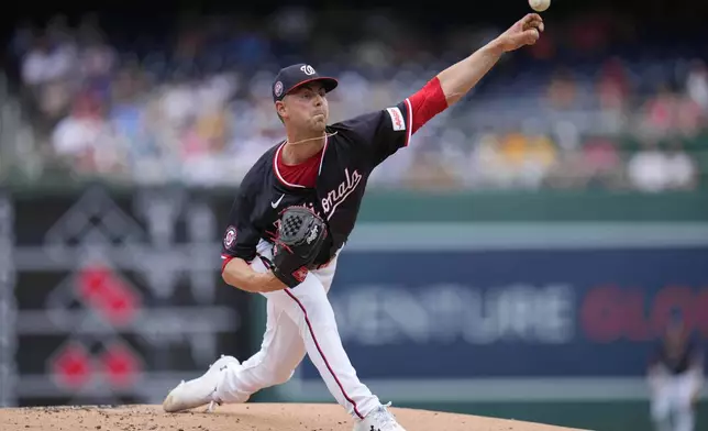 Washington Nationals starting pitcher MacKenzie Gore throws to the San Diego Padres during the first inning of a baseball game at Nationals Park, Sunday, July 20, 2025, in Washington. (AP Photo/Jess Rapfogel)