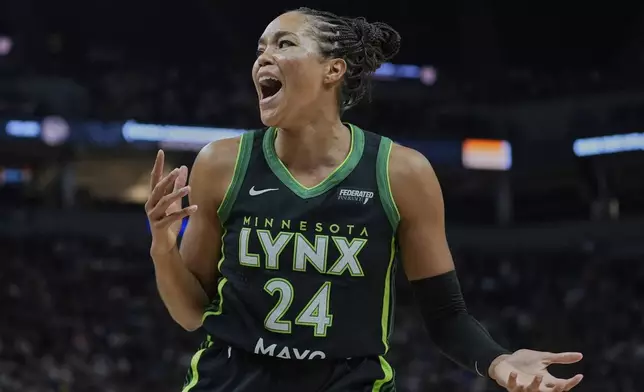 Minnesota Lynx forward Napheesa Collier (24) reacts after not receiving a foul call during the first half of the WNBA Commissioner's Cup championship basketball game against the Indiana Fever, Tuesday, July 1, 2025, in Minneapolis. (AP Photo/Abbie Parr)