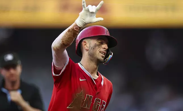Los Angeles Angels' Zach Neto reacts after hitting a solo home run in the fourth inning of a baseball game against the Atlanta Braves, Thursday, July 3, 2025, in Atlanta. (AP Photo/Colin Hubbard)