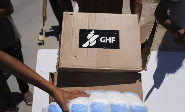FILE - Boxes and bags of humanitarian aid delivered by the Gaza Humanitarian Foundation, a U.S.-backed organization approved by Israel, are seen in Khan Younis, southern Gaza Strip, on May 29, 2025. (AP Photo/Abdel Kareem Hana, File)