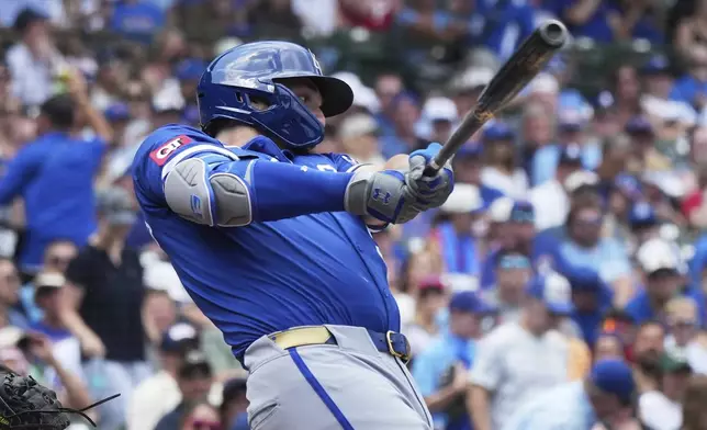 Kansas City Royals' Vinnie Pasquantino hits a two-run home run during the first inning of a baseball game against the Chicago Cubs in Chicago, Wednesday, July 23, 2025. (AP Photo/Nam Y. Huh)