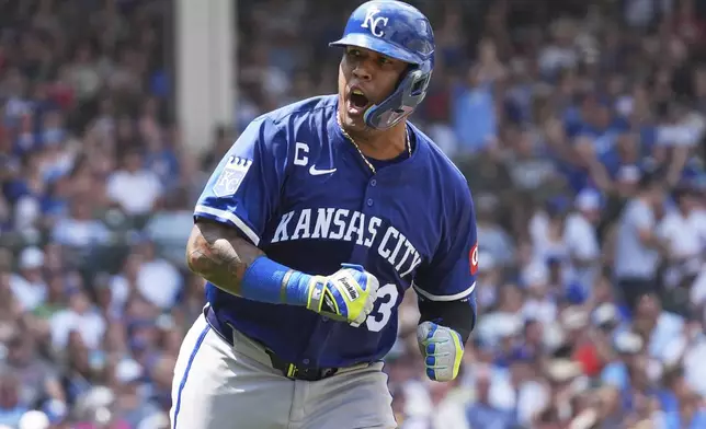 Kansas City Royals' Salvador Perez reacts as he rounds the bases after hitting a two-run home run during the third inning of a baseball game against the Chicago Cubs in Chicago, Wednesday, July 23, 2025. (AP Photo/Nam Y. Huh)