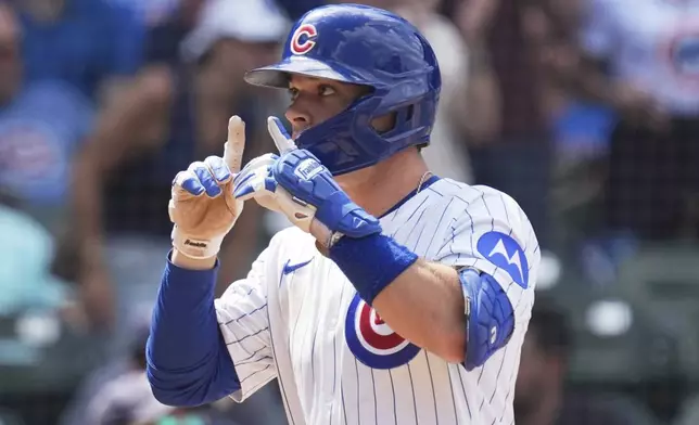 Chicago Cubs' Matt Shaw celebrates after hitting a solo home run during the seventh inning of a baseball game against the Kansas City Royals in Chicago, Wednesday, July 23, 2025. (AP Photo/Nam Y. Huh)