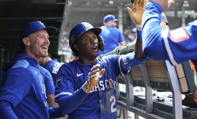 Kansas City Royals' Tyler Tolbert (2) celebrates with teammates after hitting a two-run home run during the sixth inning of a baseball game against the Chicago Cubs in Chicago, Wednesday, July 23, 2025. (AP Photo/Nam Y. Huh)