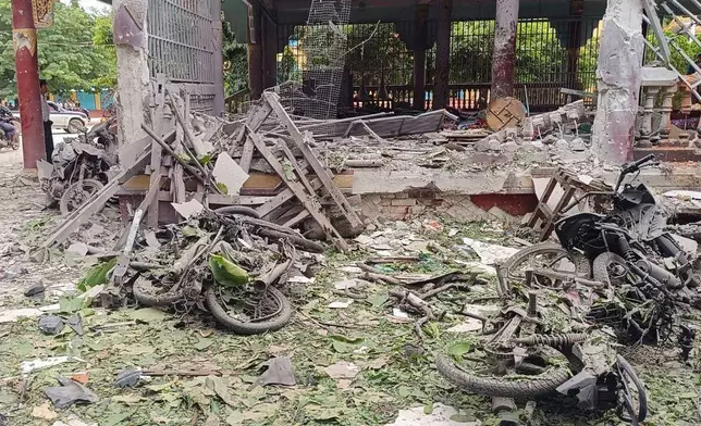 Debris is seen outside a building in a Buddhist monastery that was allegedly hit by the military’s airstrike in Sagaing township in Sagaing region, Myanmar Friday, July 11, 2025. (UGC via AP)