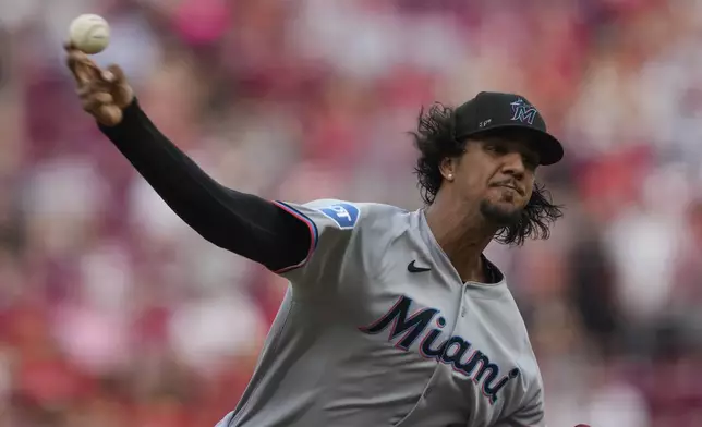 Miami Marlins pitcher Eury Pérez throws during the first inning of a baseball game against the Cincinnati Reds in Cincinnati, Tuesday, July 8, 2025. (AP Photo/Carolyn Kaster)