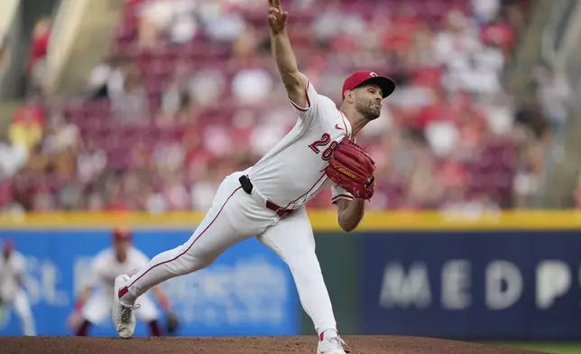 Cincinnati Reds pitcher Nick Martinez throws during the first inning of a baseball game against the Miami Marlins in Cincinnati, Tuesday, July 8, 2025. (AP Photo/Carolyn Kaster)
