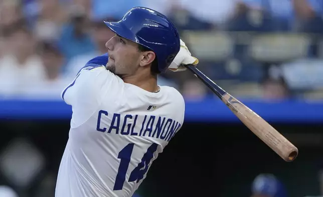 Kansas City Royals' Jac Caglianone watches his two-run home run during the third inning of a baseball game against the Pittsburgh Pirates, Wednesday, July 9, 2025, in Kansas City, Mo. (AP Photo/Charlie Riedel)