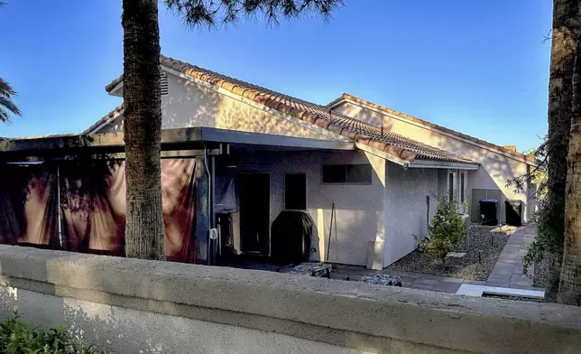 The residence of Shane Tamura, identified as the gunman in the fatal shooting at a Manhattan office building in New York City and who was killed by a self-inflicted gunshot wound is seen on Monday, July 28, 2025 in Las Vegas, Nev. (AP Photo/Ty O'Neil)