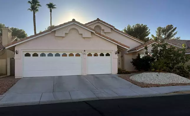 The residence of Shane Tamura, identified as the gunman in the fatal shooting at a Manhattan office building in New York City and who was killed by a self-inflicted gunshot wound is seen on Monday, July 28, 2025 in Las Vegas, Nev. (AP Photo/Ty O'Neil)