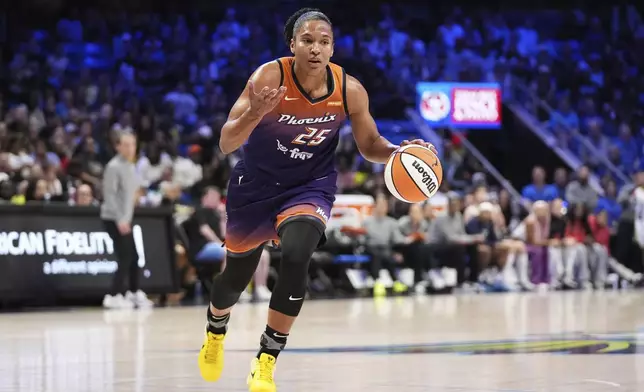Phoenix Mercury forward Alyssa Thomas works to the basket in the first half of a WNBA basketball game against the Dallas Wings, Thursday, July 3, 2025, in Arlington, Texas. (AP Photo/Tony Gutierrez)