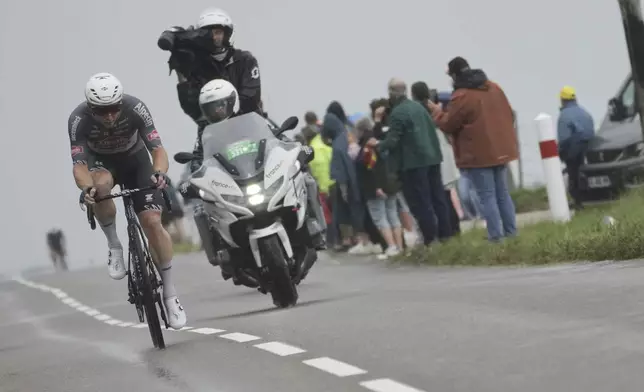Stage winner Australia's Kaden Groves rides breakaway during the twentieth stage of the Tour de France cycling race over 184.2 kilometers (114.5 miles) with start in Nantua and finish in Pontarlier, France, Saturday, July 26, 2025. (AP Photo/Thibault Camus)