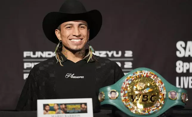 WBC welterweight champion Mario Barrios attends a news conference Wednesday, July 16, 2025, in Las Vegas. (AP Photo/John Locher)