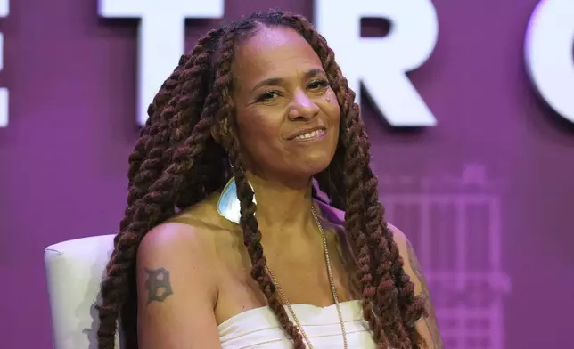 Jessica Care Moore, Detroit Poet Laureate, speaks at a Global Citizen NOW event in Detroit, Thursday, July 10, 2025. (AP Photo/Paul Sancya)