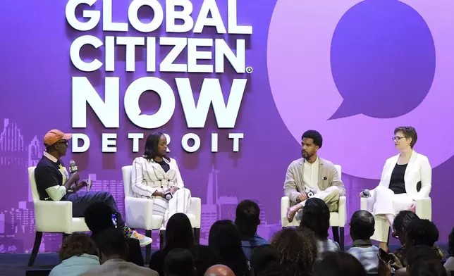 Marcus Samuelsson, from left, Isabelle Kamariza, Jon Kent, and Kate Krauss talk on a panel at a Global Citizen NOW event in Detroit, Thursday, July 10, 2025. (AP Photo/Paul Sancya)
