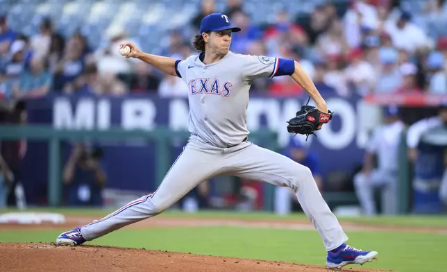 Texas Rangers pitcher Jacob deGrom delivers during the first inning of a baseball game against the Los Angeles Angels, Monday, July 28, 2025, in Anaheim, Calif. (AP Photo/William Liang)