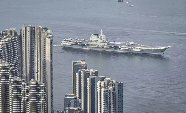 China's first domestically built aircraft carrier Shandong sails into Hong Kong for port call Thursday, July 3, 2025. (AP Photo/Chan Long Hei)