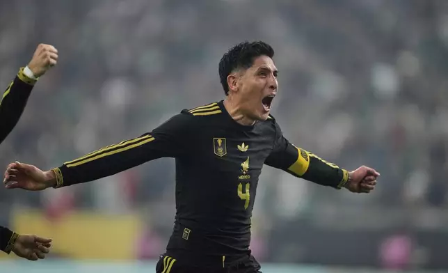 Mexico midfielder Edson Álvarez (4) celebrates after scoring against the United States in the second half of the CONCACAF Gold Cup final soccer match in Houston, Sunday, July 6, 2025. (AP Photo/Ashley Landis)