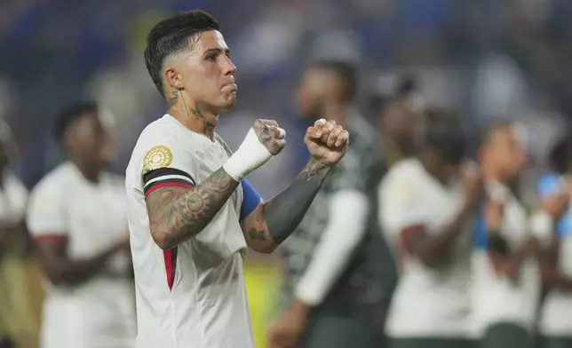 Chelsea's Enzo Fernandez reacts at the end of the Club World Cup quarterfinal soccer match between Palmeiras and Chelsea in Philadelphia, Friday, July 4, 2025. (AP Photo/Chris Szagola)
