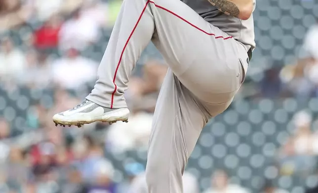 Boston Red Sox starting pitcher Lucas Giolito (54) delivers a pitch against the Minnesota Twins during the first inning of baseball game Tuesday, July 29, 2025, in Minneapolis. (AP Photo/Matt Krohn)