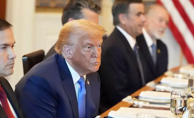 Secretary of State Marco Rubio, from left, President Donald Trump, Defense Secretary Pete Hegseth, obstructed, CIA Director John Ratcliffe and U.S. Ambassador to Israel Mike Huckabee listen during a meeting with Israel's Prime Minister Benjamin Netanyahu in the Blue Room of the White House, Monday, July 7, 2025, in Washington. (AP Photo/Alex Brandon)