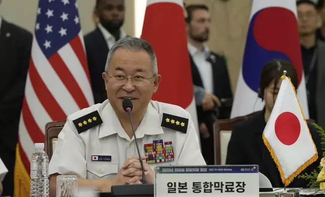 Gen, Yoshihide Yoshida, Chief of Staff, Joint Staff of Japan, speaks during a Trilateral Chiefs of Defense meeting with Adm. Kim Myung-soo, chairman of the South Korean Joint Chiefs of Staff, and John Daniel Caine, Chairman of the U.S. Joint Chiefs of Staff, (both are not in the picture) at the Defense Ministry in Seoul, South Korea, Friday, July 11, 2025. (AP Photo/Ahn Young-joon, Pool)