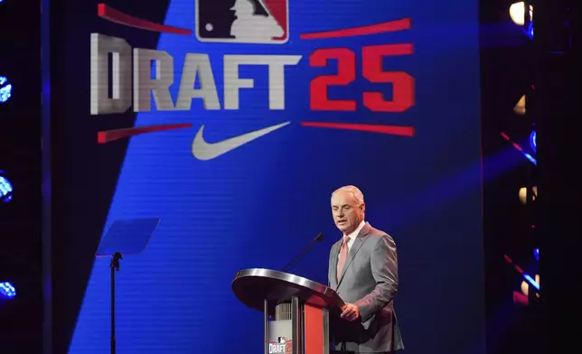 MLB Commissioner Rob Manfred speaks during the first round of the MLB baseball draft Sunday, July, 13, 2025 in Atlanta. (AP Photo/Mike Stewart)