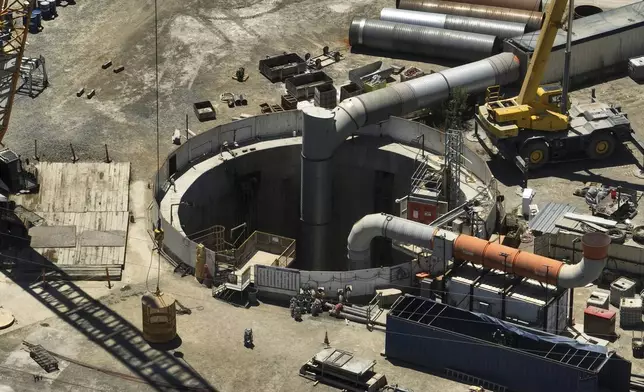 An aerial view shows the only entrance to an industrial tunnel in the Wilmington neighborhood of Los Angeles, Thursday, July 10, 2025, after a section of the tunnel partially collapsed Wednesday night. (AP Photo/Jae C. Hong)