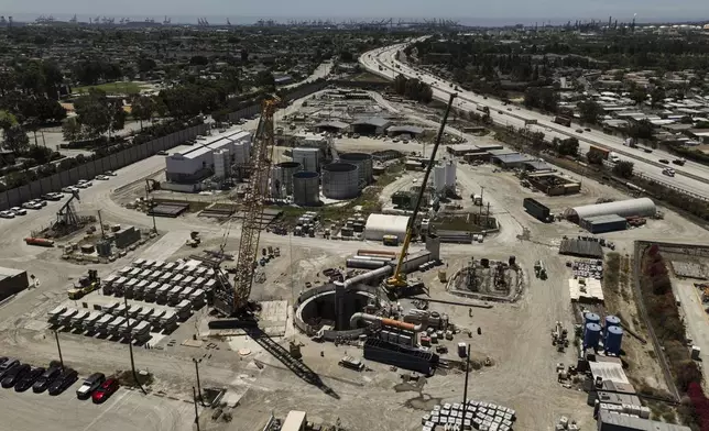 An aerial view shows the only entrance to an industrial tunnel in the Wilmington neighborhood of Los Angeles, Thursday, July 10, 2025, after a section of the tunnel partially collapsed Wednesday night. (AP Photo/Jae C. Hong)