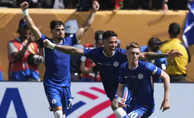 Chelsea's Cole Palmer (10) celebrates after scoring his side's second goal during the Club World Cup final soccer match between Chelsea and PSG in East Rutherford, N.J., Sunday, July 13, 2025. (AP Photo/Seth Wenig)