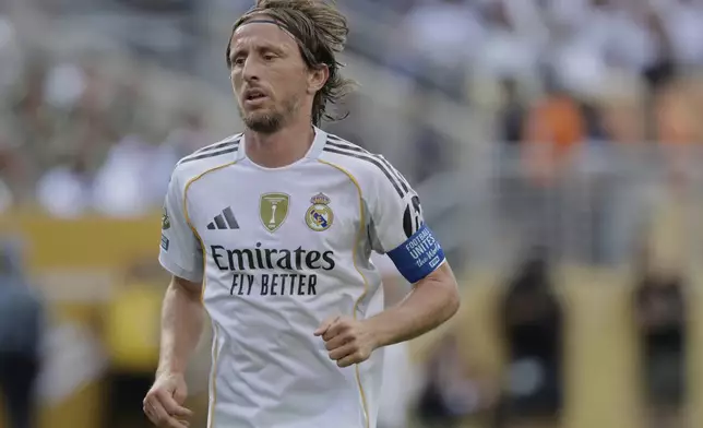 Real Madrid's Luka Modric looks on during the Club World Cup semifinal soccer match between PSG and Real Madrid in East Rutherford, N.J., Wednesday, July 9, 2025. (AP Photo/Adam Hunger)