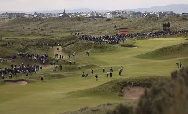 Rory McIlroy of Northern Ireland plays his second shot on the 7th hole during the third round of the British Open golf championship at the Royal Portrush Golf Club, Northern Ireland, Saturday, July 19, 2025. (AP Photo/Peter Morrison)