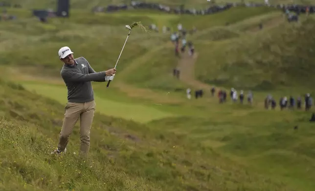 Keegan Bradley of the United States plays from the rough on the 7th hole during the second round of the British Open golf championship at the Royal Portrush Golf Club, Northern Ireland, Friday, July 18, 2025. (AP Photo/Francisco Seco)