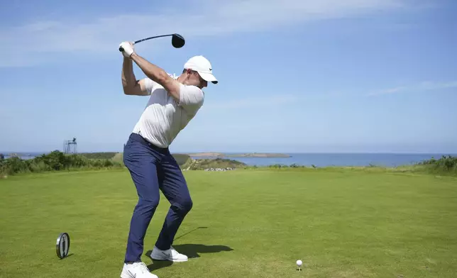 Rory McIlroy of Northern Ireland tees off on the 5th hole during a practice round for the British Open golf championship at the Royal Portrush Golf Club, Northern Ireland, Wednesday, July 16, 2025. (AP Photo/Jon Super)