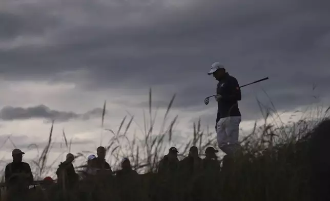 Matt Fitzpatrick of England walks off the 18th tee during the second round of the British Open golf championship at the Royal Portrush Golf Club, Northern Ireland, Friday, July 18, 2025. (AP Photo/Peter Morrison)