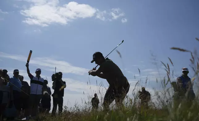 Viktor Hovland of Norway plays off the 14th tee uring a practice round for the British Open golf championship at the Royal Portrush Golf Club, Northern Ireland, Wednesday, July 16, 2025. (AP Photo/Jon Super)