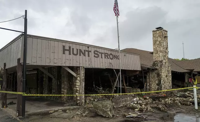 The Hunt Store in Hunt, Texas, is roped off after severe damage from recent flooding along the Guadalupe River on Sunday, July 6, 2025. (AP Photo/Rodolfo Gonzalez)