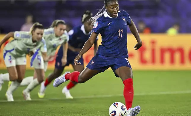 France's Kadidiatou Diani shoots a penalty to score during the Euro 2025, group D, soccer match between France and Wales at Arena St. Gallen in St. Gallen, Switzerland, Wednesday, July 9, 2025