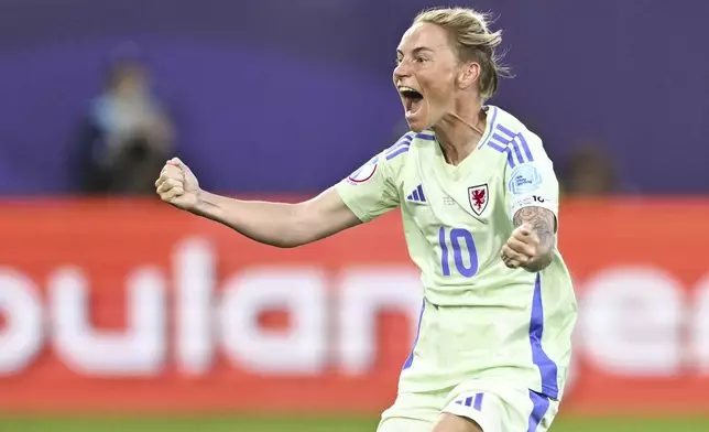 Wales's Jessica Fishlock celebrates after scoring her side's first goal during the Euro 2025, group D, soccer match between France and Wales at Arena St. Gallen in St. Gallen, Switzerland, Wednesday, July 9, 2025. (Gian Ehrenzeller/Keystone via AP)